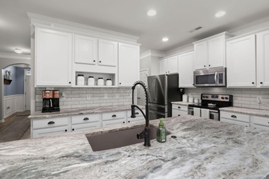 **LOWEST PRICED 6 BEDROOM IN CANE BAY/PRICED LOW TO SELL** This on Cypress Point Par 3 in South Carolina - for sale on GolfHomes.com, golf home, golf lot