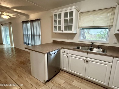 Solid concrete block 3 bedroom 2 full bath home on over 1/4 acre on St. Augustine Shores Golf Club in Florida - for sale on GolfHomes.com, golf home, golf lot