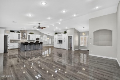 Experience resort-style living in this stunning PebbleCreek home on Tuscany Falls At Pebble Creek in Arizona - for sale on GolfHomes.com, golf home, golf lot