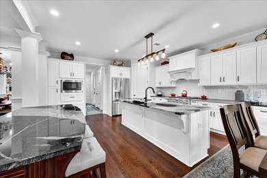 Live the coveted lake-and-golf lifestyle at Grand Harbor, a on The Patriot Golf Club At Grand Harbor in South Carolina - for sale on GolfHomes.com, golf home, golf lot