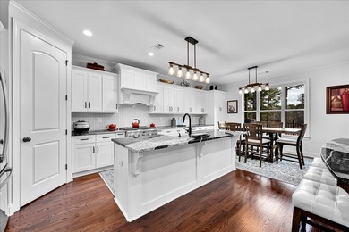 Live the coveted lake-and-golf lifestyle at Grand Harbor, a on The Patriot Golf Club At Grand Harbor in South Carolina - for sale on GolfHomes.com, golf home, golf lot