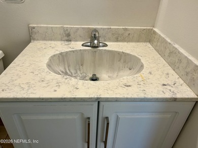 Solid concrete block 3 bedroom 2 full bath home on over 1/4 acre on St. Augustine Shores Golf Club in Florida - for sale on GolfHomes.com, golf home, golf lot