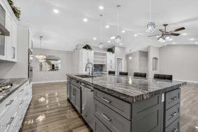 Experience resort-style living in this stunning PebbleCreek home on Tuscany Falls At Pebble Creek in Arizona - for sale on GolfHomes.com, golf home, golf lot