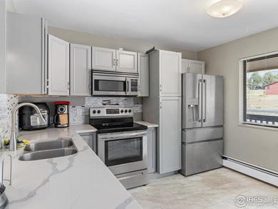 Discover this cozy, meticulously maintained 2-bedroom, 1-bath on Lake Estes Golf Course in Colorado - for sale on GolfHomes.com, golf home, golf lot