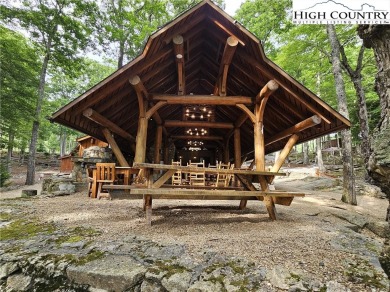 Embrace luxurious mountain living on this rare 5-acre lot with on Beech Mountain Club in North Carolina - for sale on GolfHomes.com, golf home, golf lot