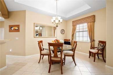 This beautifully maintained 3-bedroom, 2-bath villa with a 2-car on Eagle Marsh Golf Club in Florida - for sale on GolfHomes.com, golf home, golf lot