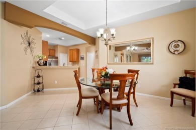 This beautifully maintained 3-bedroom, 2-bath villa with a 2-car on Eagle Marsh Golf Club in Florida - for sale on GolfHomes.com, golf home, golf lot