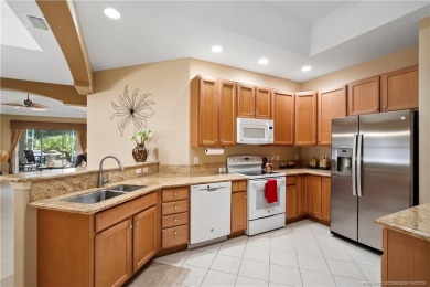This beautifully maintained 3-bedroom, 2-bath villa with a 2-car on Eagle Marsh Golf Club in Florida - for sale on GolfHomes.com, golf home, golf lot