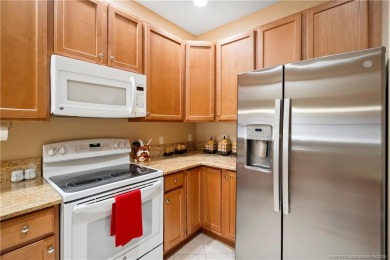 This beautifully maintained 3-bedroom, 2-bath villa with a 2-car on Eagle Marsh Golf Club in Florida - for sale on GolfHomes.com, golf home, golf lot