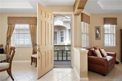 This beautifully maintained 3-bedroom, 2-bath villa with a 2-car on Eagle Marsh Golf Club in Florida - for sale on GolfHomes.com, golf home, golf lot