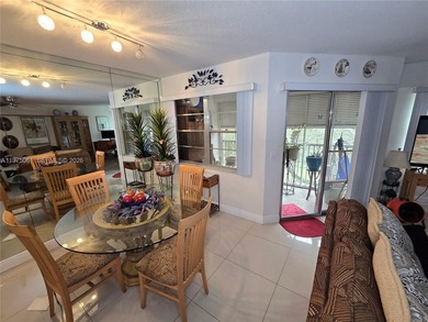 Beautifully maintained 1-bedroom, 1.5-bath condo in the highly on Flamingo Lakes Country Club in Florida - for sale on GolfHomes.com, golf home, golf lot