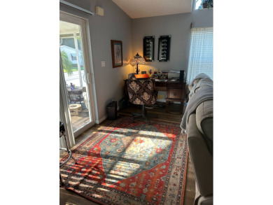 This charming 1996 2-bedroom Palm Harbor home is a must-see! on Schalamar Creek Golf and Country Club in Florida - for sale on GolfHomes.com, golf home, golf lot