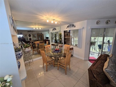 Beautifully maintained 1-bedroom, 1.5-bath condo in the highly on Flamingo Lakes Country Club in Florida - for sale on GolfHomes.com, golf home, golf lot