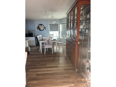 This charming 1996 2-bedroom Palm Harbor home is a must-see! on Schalamar Creek Golf and Country Club in Florida - for sale on GolfHomes.com, golf home, golf lot