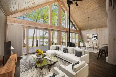 STUNNING WATERFRONT LAKE HOME! This remarkable lakefront on Garland Resort and Golf Club  in Michigan - for sale on GolfHomes.com, golf home, golf lot