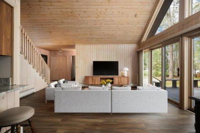 STUNNING WATERFRONT LAKE HOME! This remarkable lakefront on Garland Resort and Golf Club  in Michigan - for sale on GolfHomes.com, golf home, golf lot