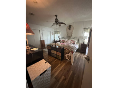 This charming 1996 2-bedroom Palm Harbor home is a must-see! on Schalamar Creek Golf and Country Club in Florida - for sale on GolfHomes.com, golf home, golf lot