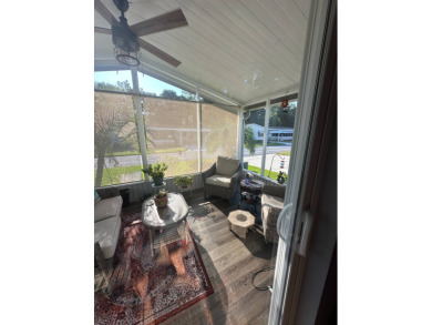 This charming 1996 2-bedroom Palm Harbor home is a must-see! on Schalamar Creek Golf and Country Club in Florida - for sale on GolfHomes.com, golf home, golf lot