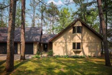 STUNNING WATERFRONT LAKE HOME! This remarkable lakefront on Garland Resort and Golf Club  in Michigan - for sale on GolfHomes.com, golf home, golf lot