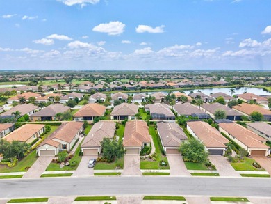 Price Adjustment!! Welcome to your dream home on Savona Run in on Esplanade Golf and Country at Lakewood Ranch in Florida - for sale on GolfHomes.com, golf home, golf lot