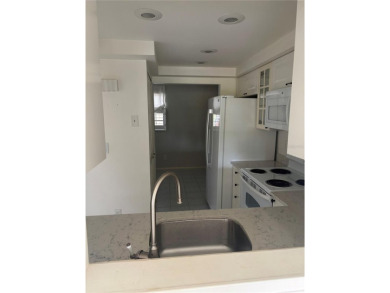 Attention Investors!  Great first floor unit listed below market on Palm Aire Country Club of Sarasota in Florida - for sale on GolfHomes.com, golf home, golf lot