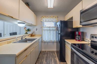 Relaxed coastal living meets scenic golf course and pond views on Rockport Country Club in Texas - for sale on GolfHomes.com, golf home, golf lot