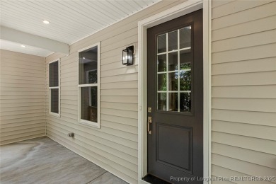 This lovely new construction home is located in the friendly on Carolina Trace Country Club in North Carolina - for sale on GolfHomes.com, golf home, golf lot