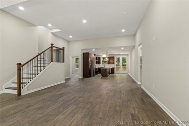 This lovely new construction home is located in the friendly on Carolina Trace Country Club in North Carolina - for sale on GolfHomes.com, golf home, golf lot