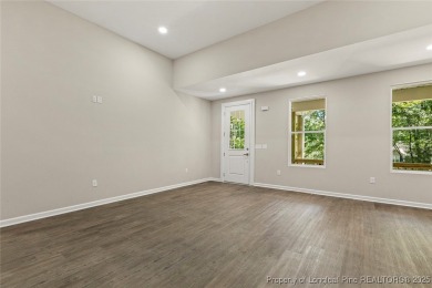 This lovely new construction home is located in the friendly on Carolina Trace Country Club in North Carolina - for sale on GolfHomes.com, golf home, golf lot