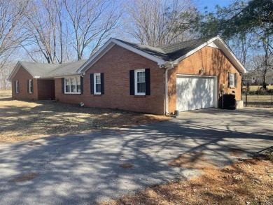 Check out this beautiful home nestled in a golf course community on Franklin Country Club in Kentucky - for sale on GolfHomes.com, golf home, golf lot