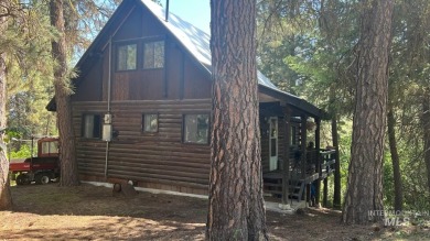 A cozy little log cabin. Two bedrooms, one is in the large open on Terrace Lakes Golf Resort in Idaho - for sale on GolfHomes.com, golf home, golf lot