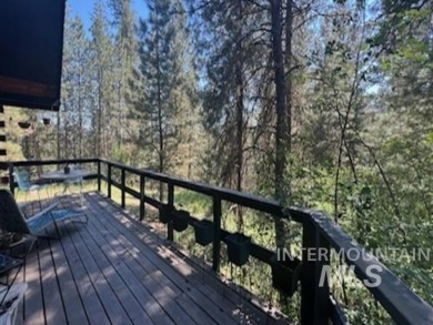 A cozy little log cabin. Two bedrooms, one is in the large open on Terrace Lakes Golf Resort in Idaho - for sale on GolfHomes.com, golf home, golf lot