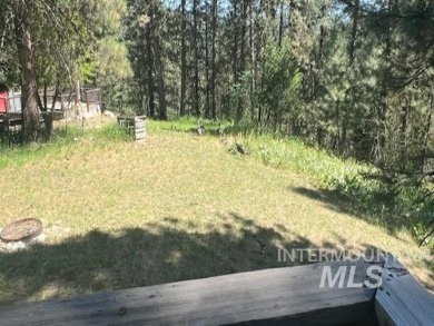 A cozy little log cabin. Two bedrooms, one is in the large open on Terrace Lakes Golf Resort in Idaho - for sale on GolfHomes.com, golf home, golf lot