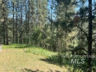A cozy little log cabin. Two bedrooms, one is in the large open on Terrace Lakes Golf Resort in Idaho - for sale on GolfHomes.com, golf home, golf lot