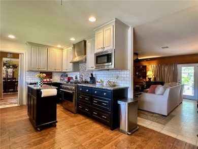 Welcome to this beautifully updated 4 bedroom, 3 full bath 1960s on Oso Beach Municipal Golf Course in Texas - for sale on GolfHomes.com, golf home, golf lot
