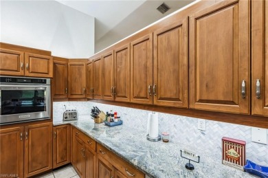 This Cape Coral home has durable tile flooring, gorgeous granite on El Rio Golf Course and Club in Florida - for sale on GolfHomes.com, golf home, golf lot