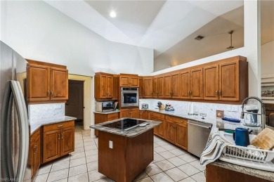 This Cape Coral home has durable tile flooring, gorgeous granite on El Rio Golf Course and Club in Florida - for sale on GolfHomes.com, golf home, golf lot