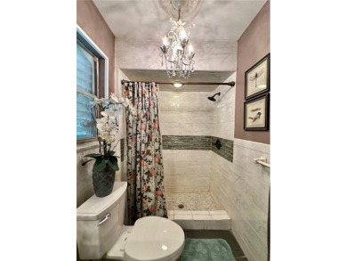 Welcome to this beautifully updated 4 bedroom, 3 full bath 1960s on Oso Beach Municipal Golf Course in Texas - for sale on GolfHomes.com, golf home, golf lot