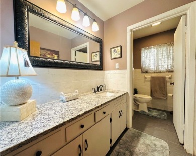 Welcome to this beautifully updated 4 bedroom, 3 full bath 1960s on Oso Beach Municipal Golf Course in Texas - for sale on GolfHomes.com, golf home, golf lot