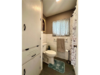 Welcome to this beautifully updated 4 bedroom, 3 full bath 1960s on Oso Beach Municipal Golf Course in Texas - for sale on GolfHomes.com, golf home, golf lot
