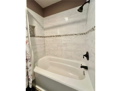 Welcome to this beautifully updated 4 bedroom, 3 full bath 1960s on Oso Beach Municipal Golf Course in Texas - for sale on GolfHomes.com, golf home, golf lot
