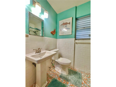 Welcome to this beautifully updated 4 bedroom, 3 full bath 1960s on Oso Beach Municipal Golf Course in Texas - for sale on GolfHomes.com, golf home, golf lot