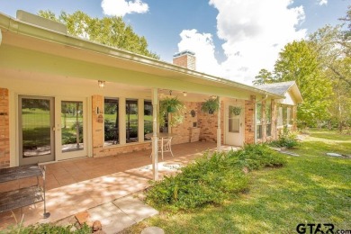 CHARMING TRADITIONAL BRICK HOME WITH STUNNING GOLF COURSE VIEWS! on Hide-A-Way Lake Golf Course in Texas - for sale on GolfHomes.com, golf home, golf lot