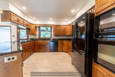 This one-of-a-kind home has it all--space, charm, updates, and on Riverside Country Club in Nebraska - for sale on GolfHomes.com, golf home, golf lot