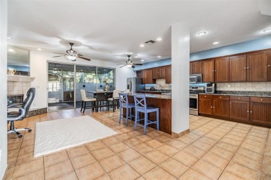 Discover a rare opportunity to own this exquisite 5-bedroom, 4 on Countryside Country Club in Florida - for sale on GolfHomes.com, golf home, golf lot