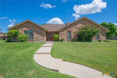 This custom corner lot home in the gorgeous Turkey Creek Estates on Hills of Cove Municipal Golf Course in Texas - for sale on GolfHomes.com, golf home, golf lot