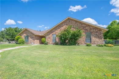 This custom corner lot home in the gorgeous Turkey Creek Estates on Hills of Cove Municipal Golf Course in Texas - for sale on GolfHomes.com, golf home, golf lot