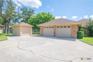 This custom corner lot home in the gorgeous Turkey Creek Estates on Hills of Cove Municipal Golf Course in Texas - for sale on GolfHomes.com, golf home, golf lot