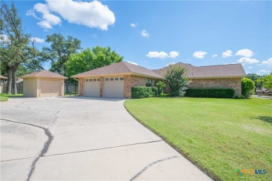 This custom corner lot home in the gorgeous Turkey Creek Estates on Hills of Cove Municipal Golf Course in Texas - for sale on GolfHomes.com, golf home, golf lot