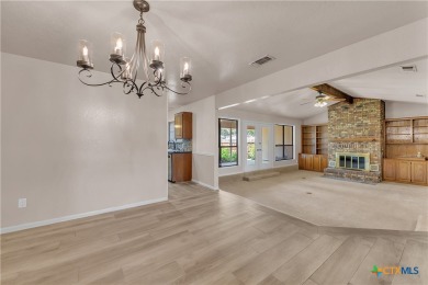 This custom corner lot home in the gorgeous Turkey Creek Estates on Hills of Cove Municipal Golf Course in Texas - for sale on GolfHomes.com, golf home, golf lot